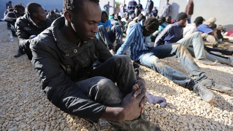 Illegal migrants caught at the coast of Souq al Jum'aa region in Tripoli, Libya, March 2015. Total of 97 migrants from Senegal, Mali, Cameroon, Nigeria and Liberia [Image credit: Mail & Guaridan, from Mustafa Bag/Anadolu Agency/Getty Images]
